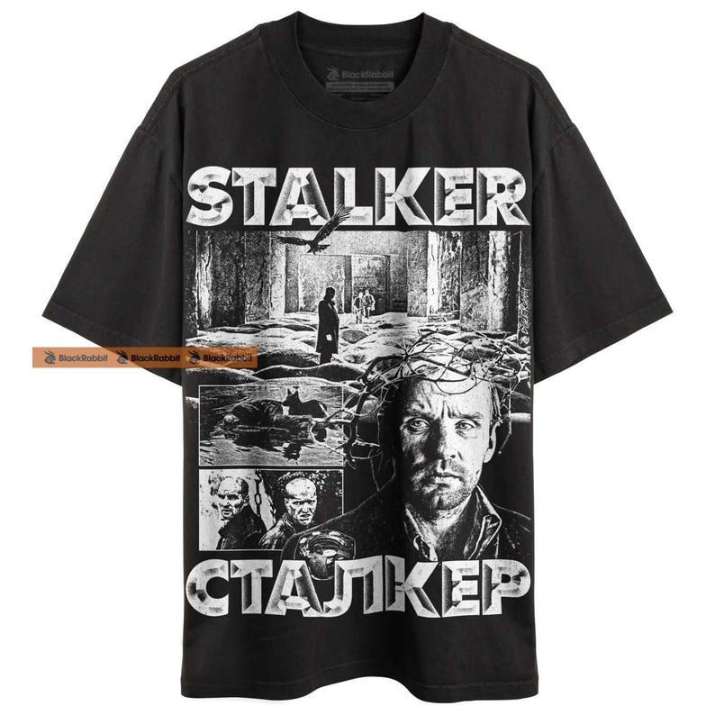 Black graphic t-shirt.