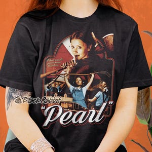 Camiseta clásica unisex inspirada en el póster de la película Pearl Horror Slasher