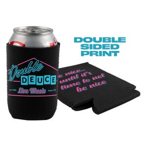 May include: Black neoprene can cooler with a pink and blue graphic that says "Double Deuce Est. 1999 Live Music Jasper, MO". The other side of the cooler has pink text that says "Be nice until it's time to not be nice".