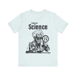 Camiseta política, camiseta "Sigue la ciencia", camiseta "Anti Big Pharma Fauci" para hombres y mujeres. Heather Ice Blue