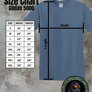 May include: A blue Gildan 5000 t-shirt with a size chart. The chart lists sizes S to 5XL, with corresponding width and length measurements in inches. The shirt has a crew neck and short sleeves. The image also includes a logo that says "DOPE APPAREL SERIOUSLY DOPE".