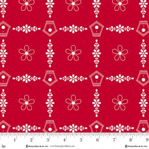 May include: Red fabric with a repeating pattern of white birdhouses, flowers, and floral sprigs. The birdhouses have a small circular opening. The fabric has a ruler along the bottom edge with measurements in inches.