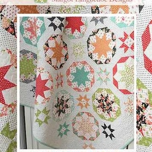 May include: A colorful quilt pattern titled "Fireworks" featuring star and octagonal shapes in red, orange, green, and black on a white background. The Pattern Basket logo is at the top.