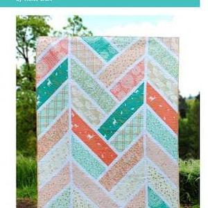 May include: A colorful quilt with a broken herringbone pattern. The quilt features a design of alternating diagonal stripes in shades of teal, orange, peach, and cream. The text "the BROKEN HERRINGBONE quilt" is at the top, with "by violet craft" below.