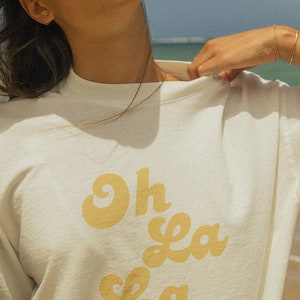Camiseta gráfica francesa Oh La La: camiseta parisina de inspiración vintage, camisa informal de verano de algodón suave, estilo chic unisex.