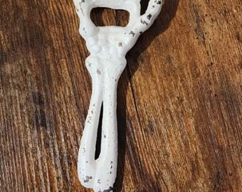 Vintage Cast Iron Skeleton Hand Bottle Opener White