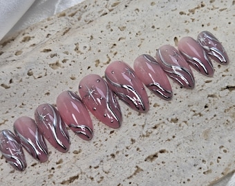 Uñas postizas de lujo en cromo plateado: diseño de galaxia estrellada