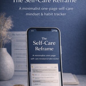 May include: A smartphone displays "The Self-Care Reframe," a minimalist one-page self-care mindset and habit tracker. The phone is in front of a blurred background with a vase, coins, and a book. The text on the phone is clear and easy to read.