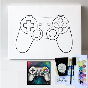 May include: A paint-by-numbers kit featuring a black and white outline of a video game controller on a white canvas. The kit includes paintbrushes, paint, and a small canvas with a colorful, painted video game controller.