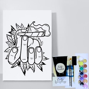 May include: Black and white line art painting kit featuring a hand holding a lit joint surrounded by marijuana leaves. The kit includes a canvas, paint brushes, and paint pots.