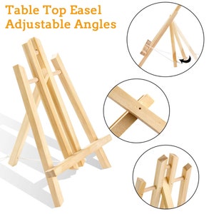 May include: A wooden table top easel with adjustable angles. The easel is made of natural wood and has a simple design. It is perfect for displaying artwork, photos, or other items.