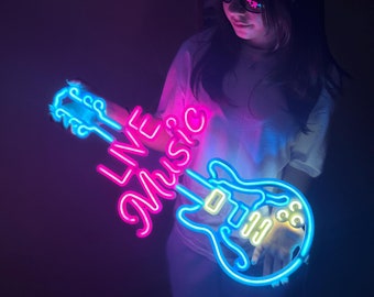 May include: A neon sign shaped like a guitar with the words "LIVE MUSIC" in pink and blue neon lights.