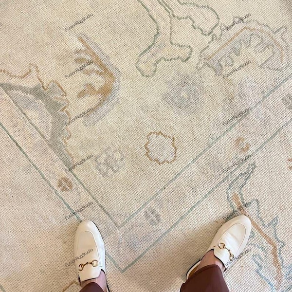 Hand Knotted Oushak Rug: Muted Cream Wool Area Rug