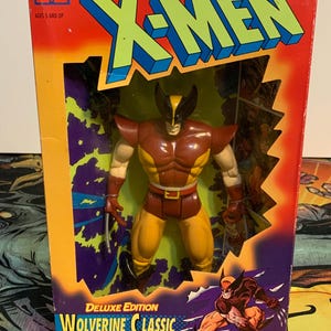 Figura de acción de X-men edición delux (lobezno)
