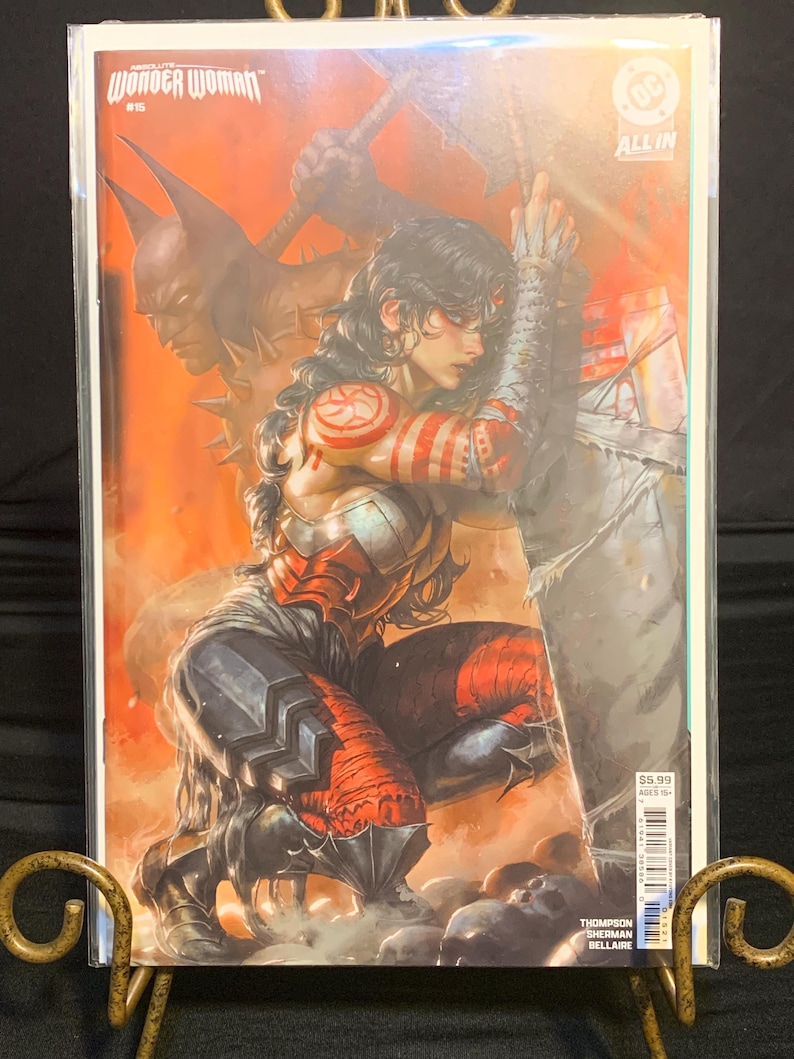 May include: A comic book cover featuring Wonder Woman in a dynamic pose, with Batman in the background. The artwork showcases a vibrant color palette with red and orange hues. The comic is titled "Wonder Woman" and has the DC Comics logo.