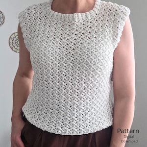 May include: Cream-colored crochet top with a sleeveless design and a round neckline. The top features a textured, open weave pattern. The words "Pattern Digital Download" are visible in the bottom right corner.