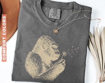 Comfort Colors Bigfoot Dandelion Shirt, Vintage Sasquatch Nature Tee, Woodland Cryptid Graphic T-Shirt, Outdoor Adventure Gift