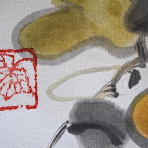 May include: Close-up of a watercolor painting featuring abstract floral elements. The artwork showcases a red square stamp with a floral design, alongside yellow, gray, and black brushstrokes on a white background.