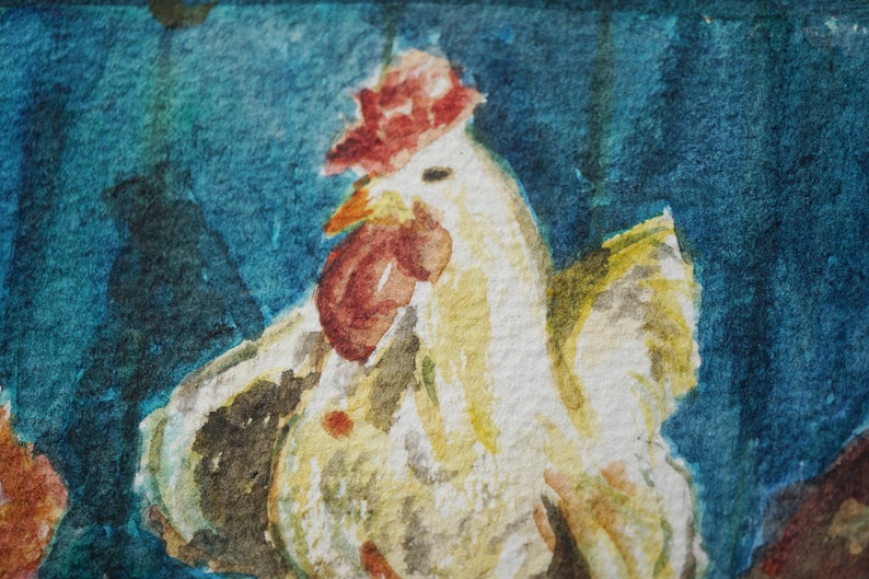May include: A watercolour painting of a rooster, featuring a red comb and wattle, and yellow and white feathers. The background is a blend of blue and teal hues, creating a textured effect. The artwork is a close-up, showcasing the rooster's features.