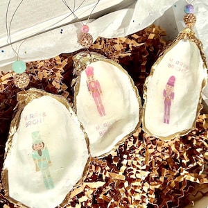 Décoration de Noël rose Casse-Noisette. Ornement de coquille de casse-noix. Huître décorative casse-noisette pastel, décoration de Noël rose, Noël palmiers sur la plage