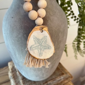 Present for Mom. Napkin ring set for coastal & beach party wedding. Coastal dinner party. Spring bohemian wedding tablescape seashell design