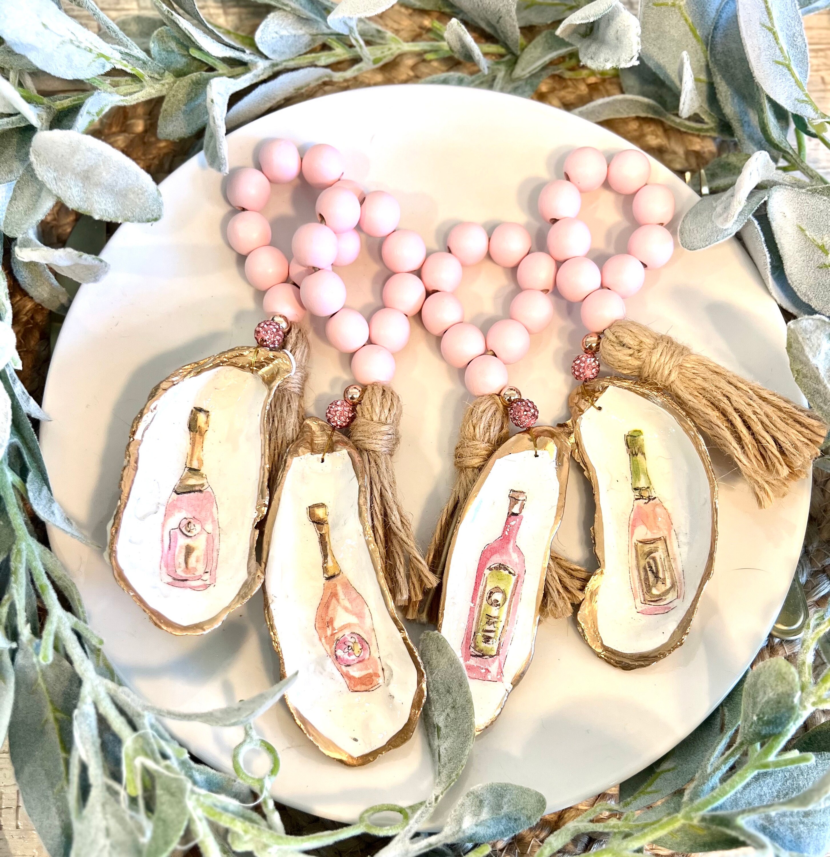 Palm beach table decor idea shell napkin ring. Palm beach event table setting pink champagne. Palm Beach gala dinner party decor idea