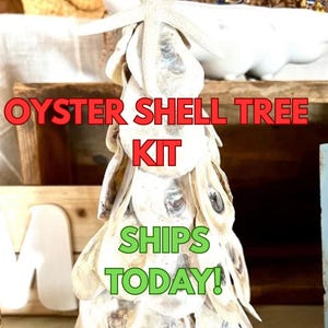 May include: A decorative oyster shell tree kit. The tree is made of oyster shells and topped with a starfish. The text "OYSTER SHELL TREE KIT" is in red, and "SHIPS TODAY!" is in green.