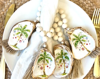 Holiday palm tree oyster shell napkin ring. Palm tree shell napkin ring set. Beachy Christmas decor. Coastal Christmas table setting idea