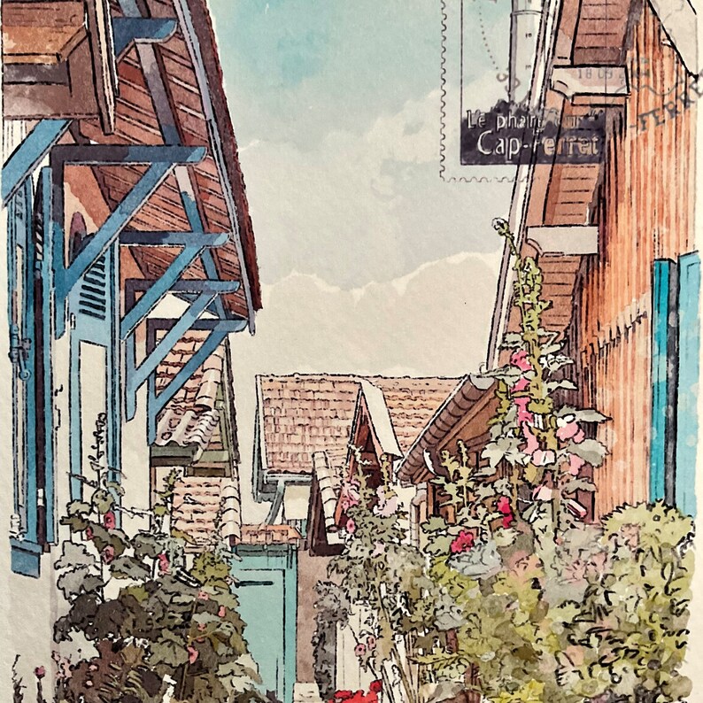 May include: Watercolor painting of a narrow street scene with buildings and flowers. The buildings have brown roofs, blue shutters, and wooden beams. The sign reads "Le phare Cap-ferret".