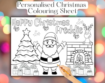 May include: Black and white colouring sheet with the text "Personalised Christmas Colouring Sheet". The sheet features a Christmas tree, Santa Claus, a reindeer, gifts, and the words "Happy Christmas Freddie".