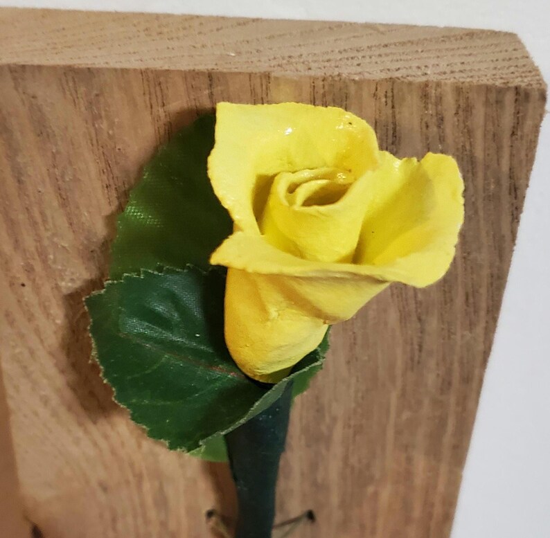 Mother's Day or any day Gift for her clay Rose on Wooden background. Yellow
