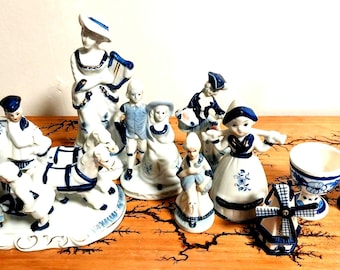 9 piece collection of blue and white rare hard to find vintage figurines