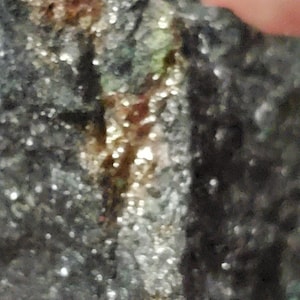 Rhodium ore, gold ore, platinum ore, silver and copper ore