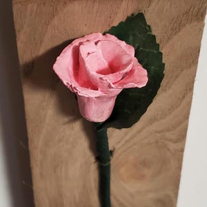 Mother's Day or any day Gift for her clay Rose on Wooden background. Pink