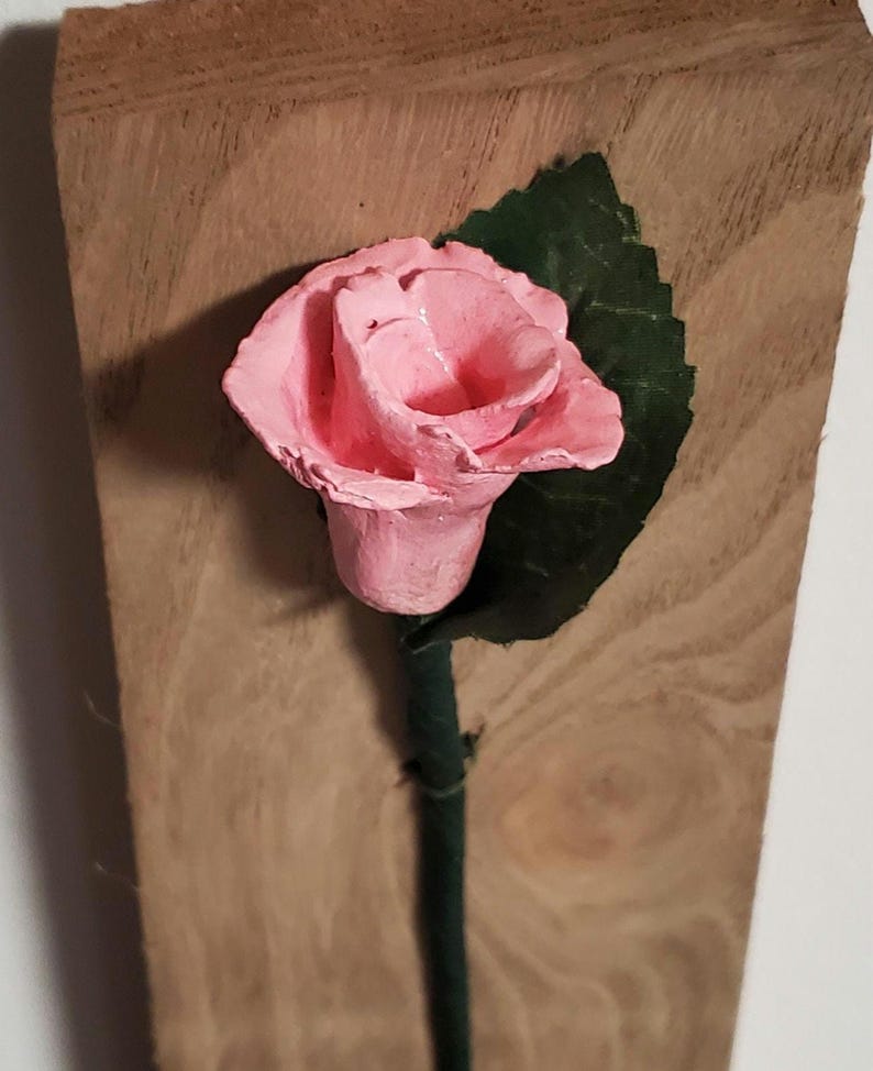 Mother's Day or any day Gift for her clay Rose on Wooden background. Pink