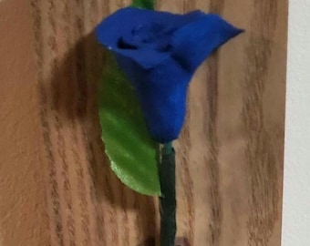 Mother's Day or any day Gift for her clay Rose on Wooden background.