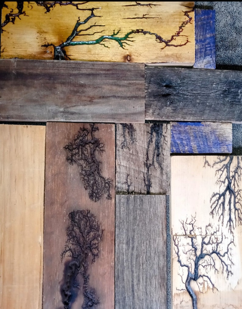 May include: A wooden wall art piece made of reclaimed wood planks with a variety of wood grain patterns and colors. The wood has been treated with a dark stain and features a unique lightning bolt design.