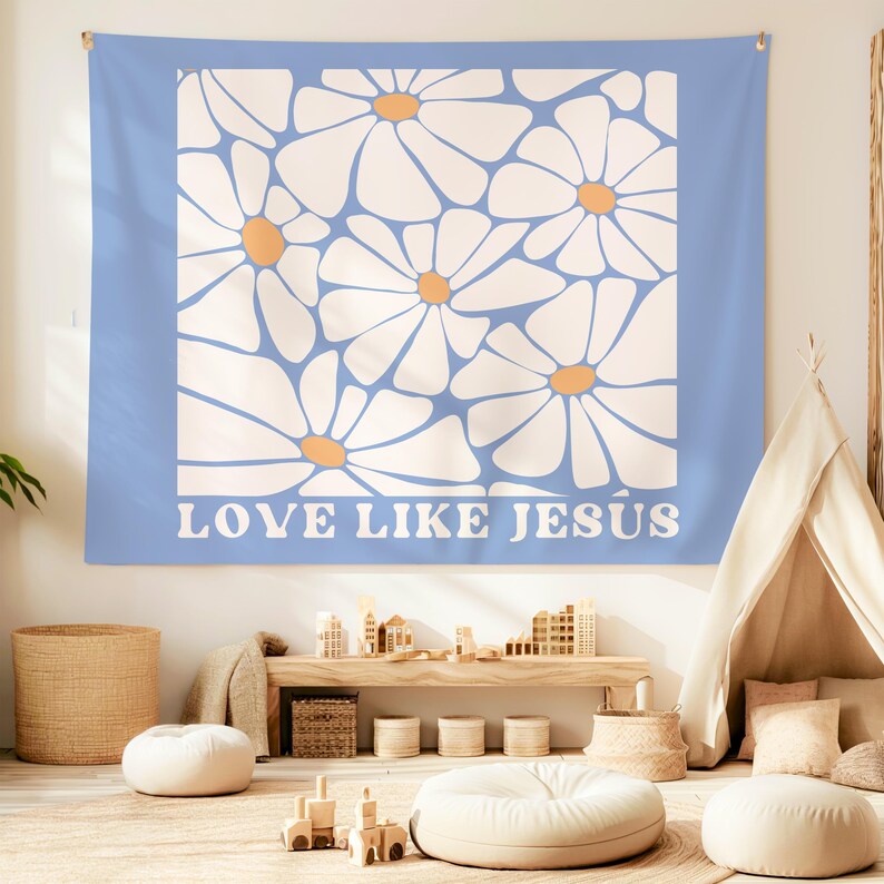 May include: A blue tapestry with a white daisy pattern and the text "LOVE LIKE JESUS" in white letters.