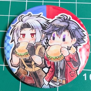 May include: A round button featuring two anime-style characters eating burgers. The button is split into blue and red sections. The characters have white and purple hair, and are wearing jackets and gloves. The background has a grid pattern.