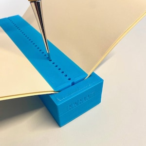 Punch tool for book binding. Punching cradle for books. Make holes in books. diary tool