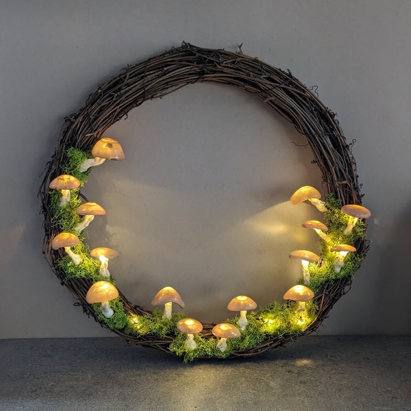 World of Whimsy Captivating 12-inch Grapevine Wreath with Fairy Lights and 16 handcrafted mushrooms Fantastic Mushroom Light Decor or Gift