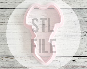 May include: A light pink cookie cutter shaped like a baby bodysuit, featuring a rounded neckline and short sleeves. The text STL FILE is overlaid in gray across the center of the cutter, which has a smooth, molded plastic construction.