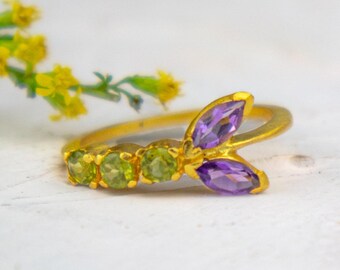 Peridot und Amethyst-Weinstock-Ring