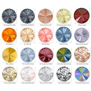 May include: Assortment of 15 different coloured crystal rhinestones. The rhinestones are round and have a faceted design. The colours include silver, gold, green, red, orange, peach, blue, lavender, yellow, white, and black.