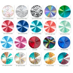 May include: A collection of 18 round, faceted crystal rhinestones in various colours, including white, silver, black, red, blue, green, pink, and turquoise. Each rhinestone has a starburst pattern.