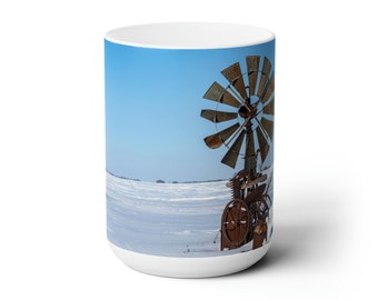 Rusty old windmill in winter  coffee mug