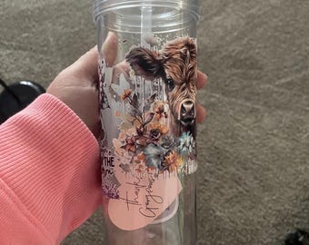 Cow cup with straw