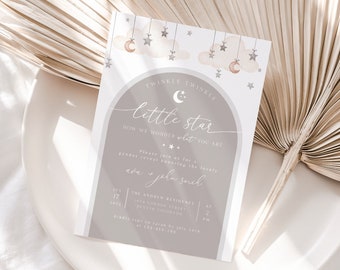 May include: A baby shower invitation with a light brown background and a white archway. The invitation features a crescent moon and stars with the text "Twinkle Twinkle Little Star" and "How we wonder what you are".