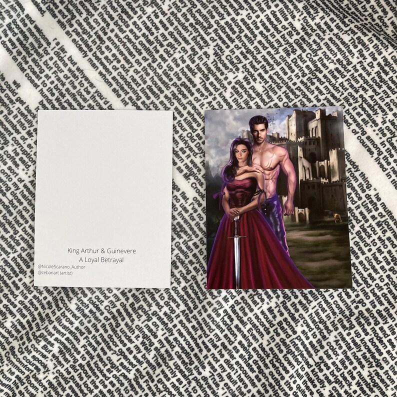 May include: A fantasy illustration of King Arthur and Queen Guinevere standing in front of a castle. Guinevere is wearing a red gown and holding a sword. Arthur is wearing a leather kilt and has his arm around Guinevere. The text "King Arthur & Guinevere A Loyal Betrayal" is at the bottom of the image.
