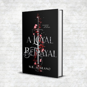 May include: A black book cover with the title "A Loyal Betrayal" in silver lettering. The cover features a silver sword with red roses and thorns wrapped around it. The author's name, "N.R. Scarano", is printed in silver at the bottom of the cover.